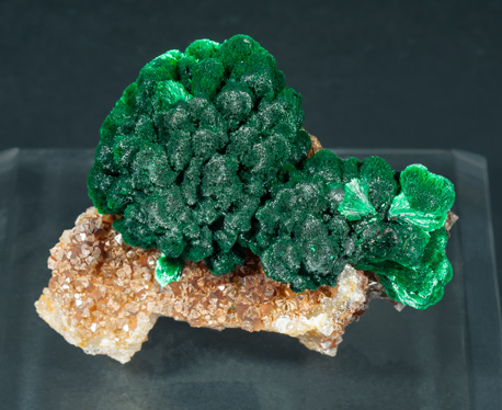 Malachite on Quartz with Goethite inclusions. Front