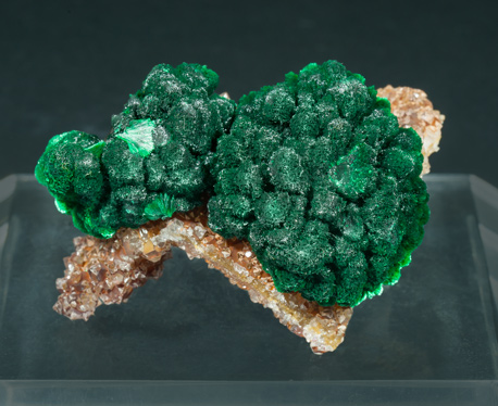 Malachite on Quartz with Goethite inclusions. Rear